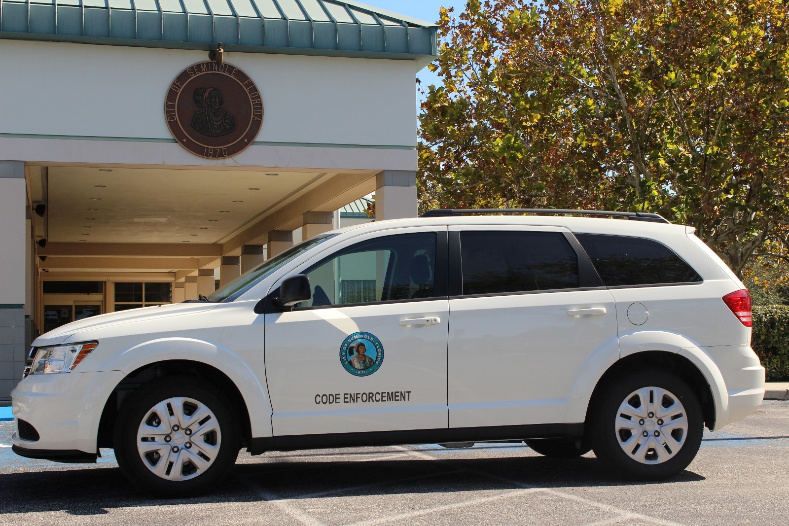 Code Enforcement vehicle at 9199 113th Street, Seminole, FL 33772