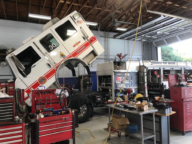 Engine 30 with the cab tilted in the garage for maintenance.